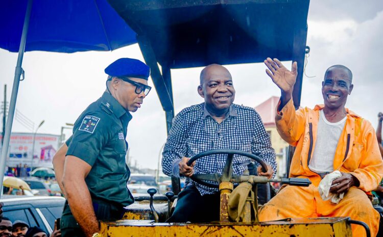  OTTI DEFIES RAIN, SUPERVISES CLEARING OF REFUSE IN ABA